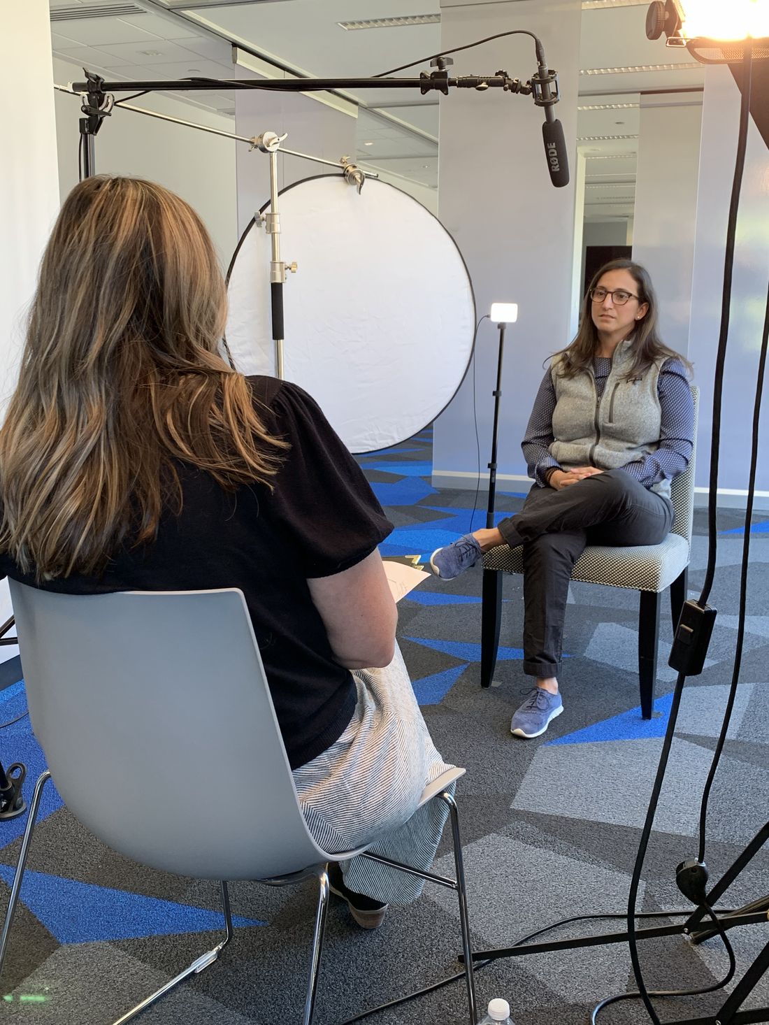 Taissa Maleh being interviewed on camera