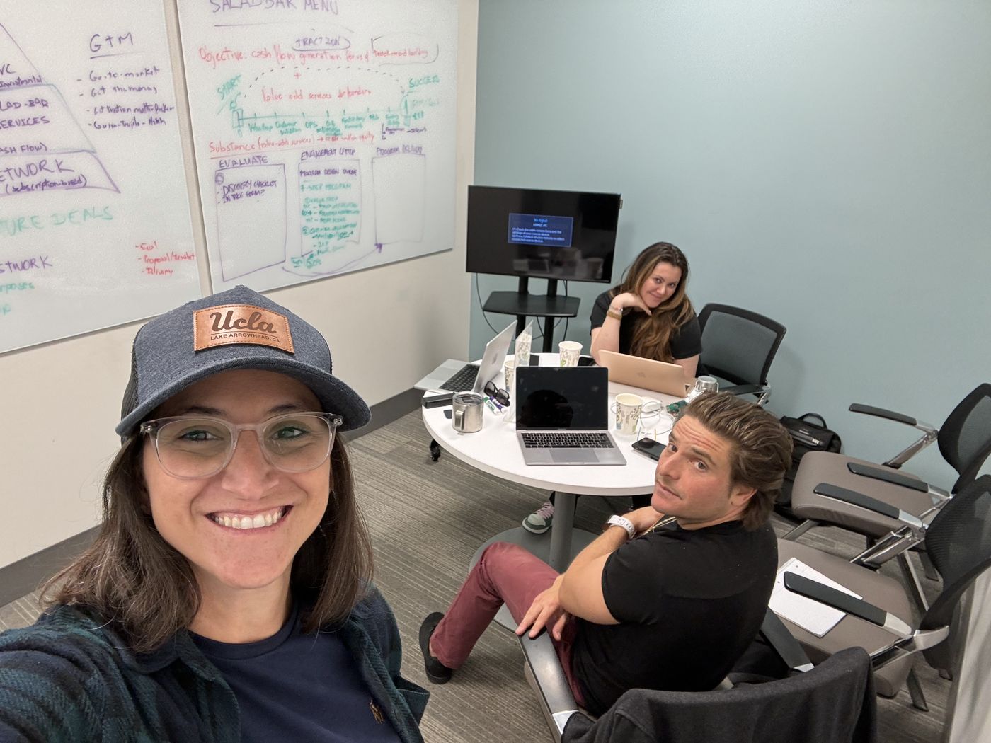 Taissa Maleh in a startup strategy session at a whiteboard